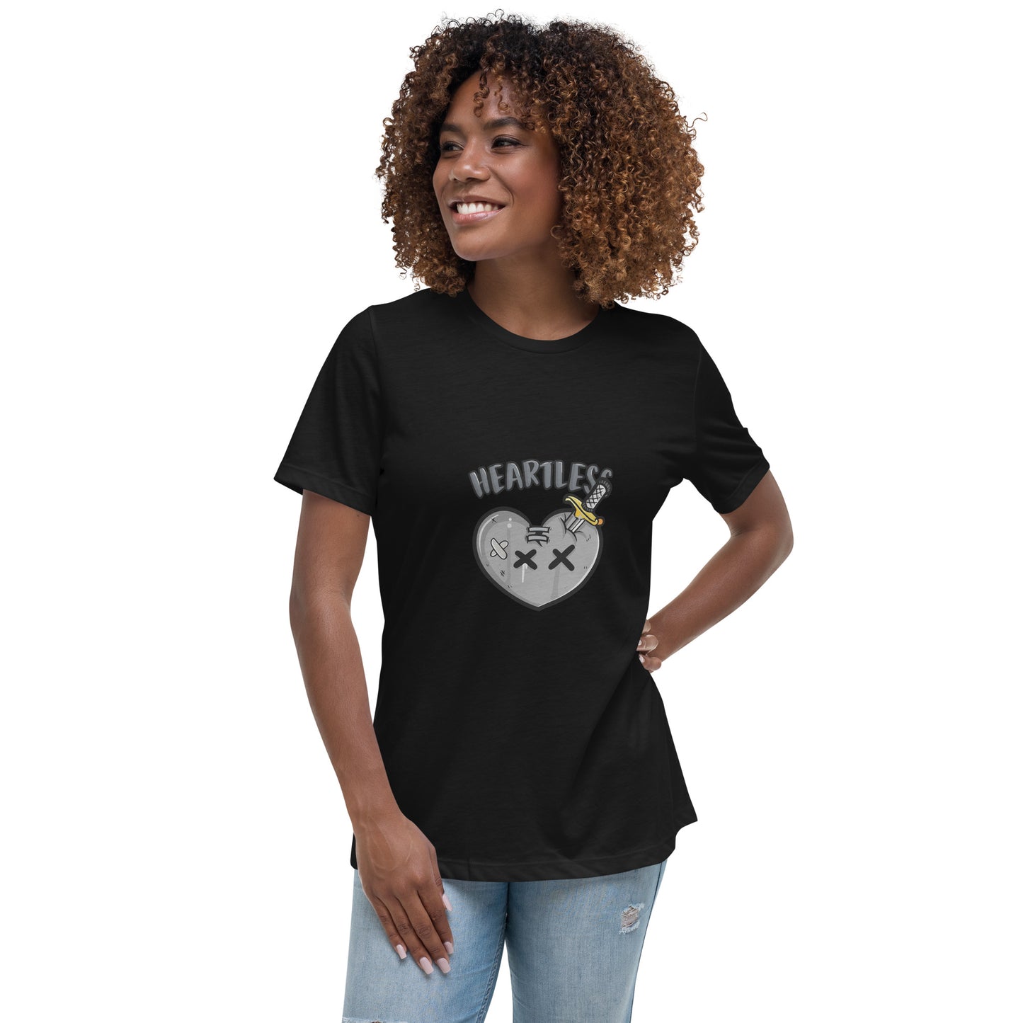 Heartless streetwear T shirt with a broken heart cartoon graphic, dagger artwork and bold lettering, printed with high quality DTF printing in the UK.