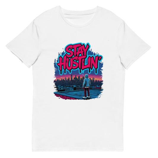 Graffiti-style Stay Hustlin' text with a person in a hoodie looking over a city skyline at sunset.