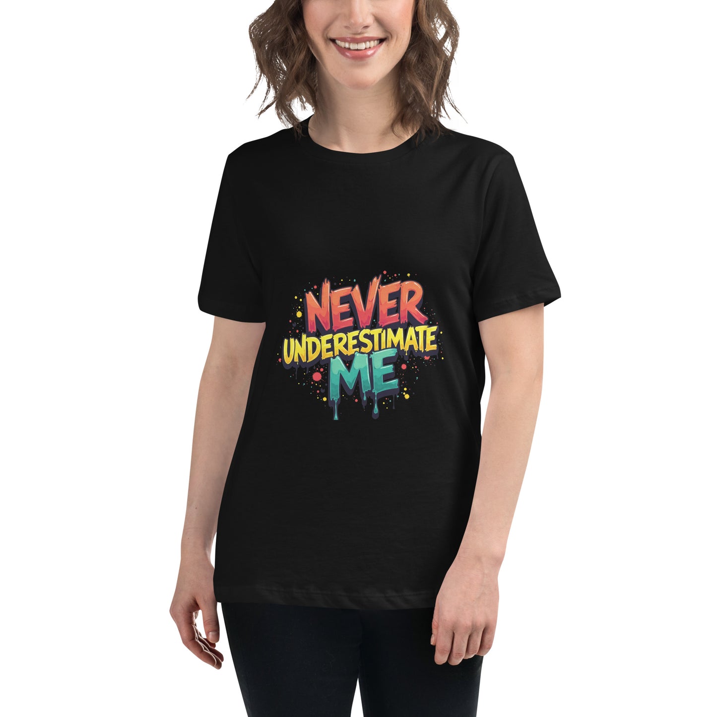 Never Underestimate Me t-shirt design with bold graffiti-style lettering in red, yellow, and teal splatter effect.
