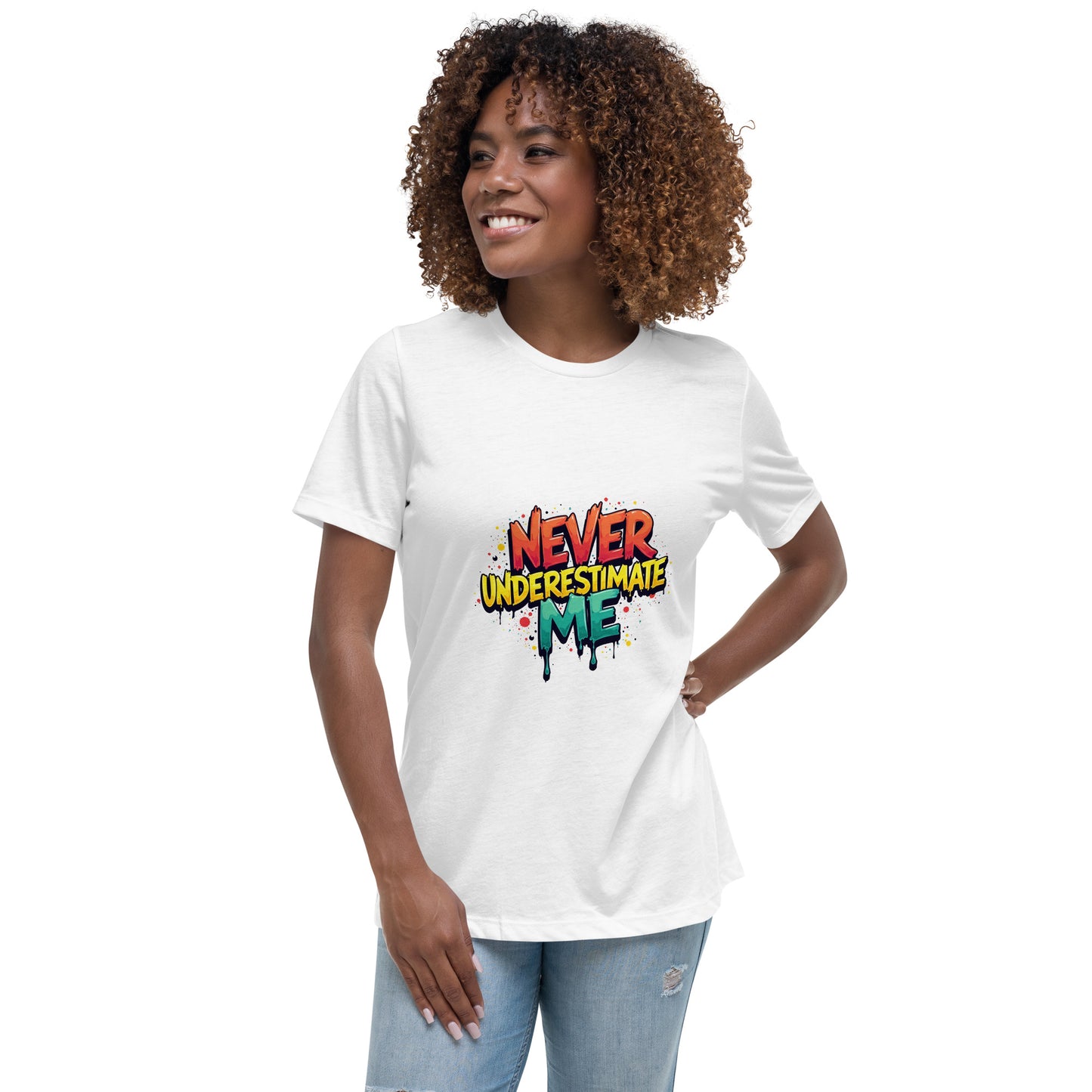 Never Underestimate Me t-shirt design with bold graffiti-style lettering in red, yellow, and teal splatter effect.