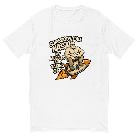 Somebody Call NASA My Muscles Are Taking Off T shirt design featuring a muscular cartoon character riding a rocket, created for funny gym apparel, fitness humour clothing and professionally printed with high quality DTF printing in the UK