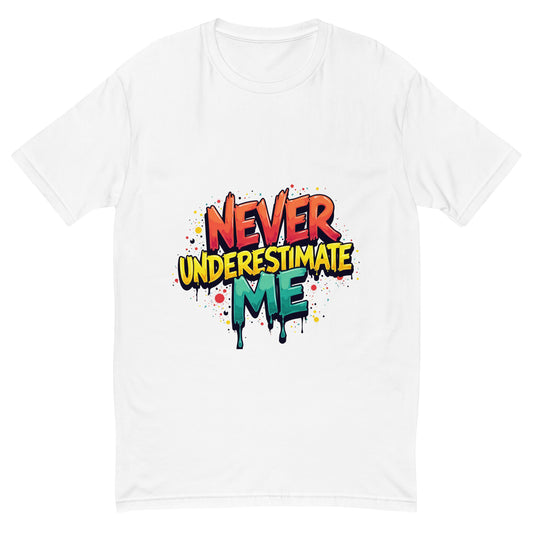 Never Underestimate Me t-shirt design with bold graffiti-style lettering in red, yellow, and teal splatter effect.

