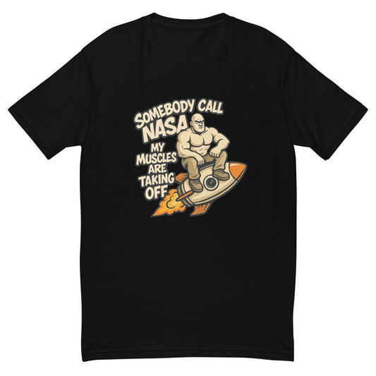 Somebody Call NASA My Muscles Are Taking Off T shirt design featuring a muscular cartoon character riding a rocket, created for funny gym apparel, fitness humour clothing and professionally printed with high quality DTF printing in the UK